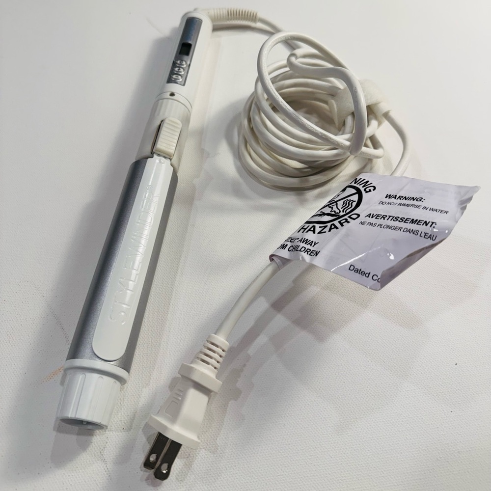 EUC 1.5” barrel Bio Ionic Stylewinder Rotating Style Iron